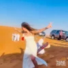 Group of guests on the red dunes during a Dubai desert safari group booking