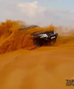 nissan-patrol-dune-bashing-red-dunes-dubai -Evening Desert Safari with BBQ Dinner - desert trip dubai - Website handled by mustajabhub.com