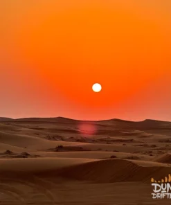 sunset-over-dunes-dubai-desert-safari - Sundowner dune dinner safari Dubai - desert safari in dubai - website handled by mustajabhub.com