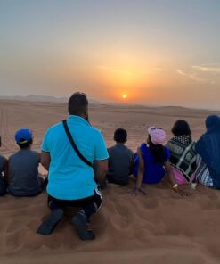 rear image of the family in family desert tour Dubai - Desert Safari Dubai