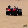 red-quad-bike-atv-dubai-desert-sandpit - dubai desert tours - Quad bike rental dubai tour - Handled by Mustajabhub.com