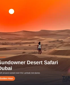 Guest walking the red dunes at sunset on a Dubai sundowner safari
